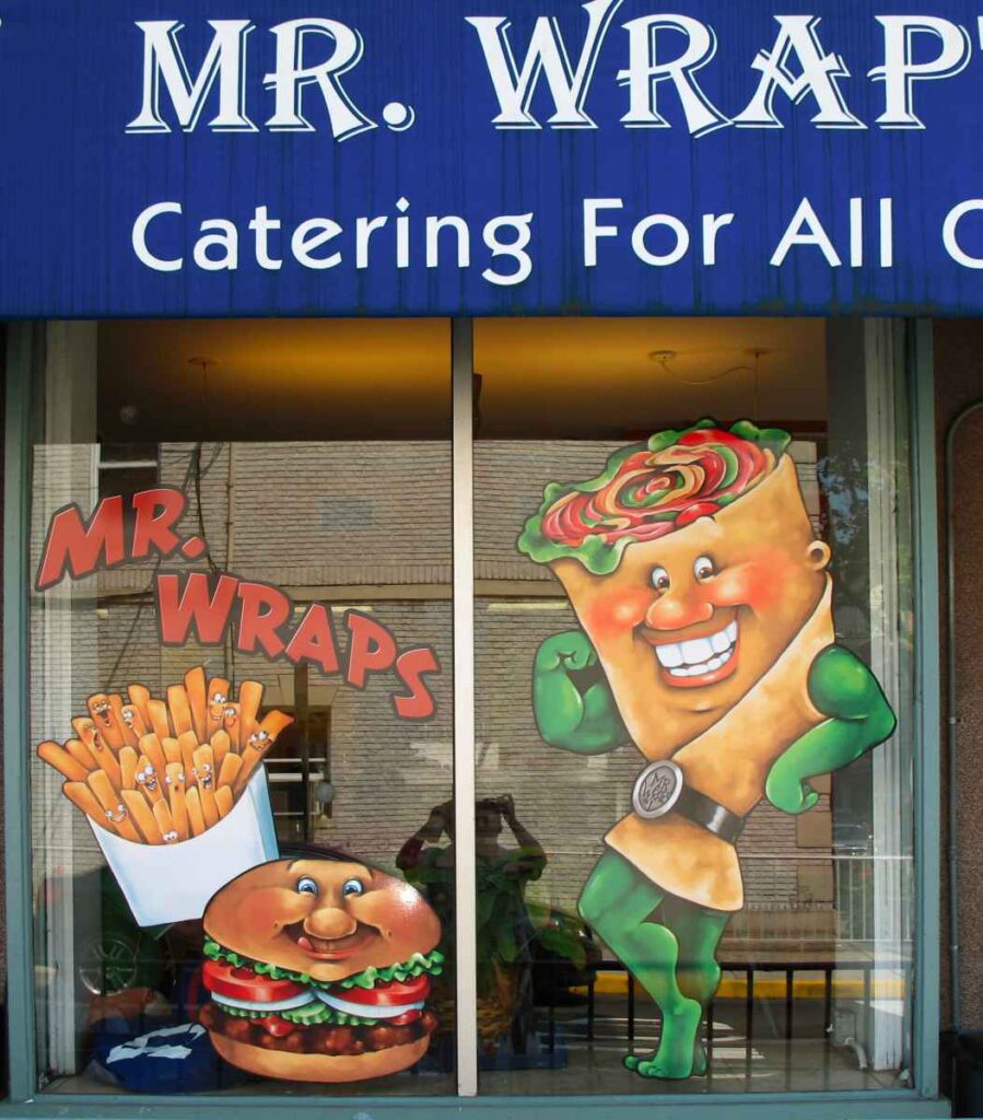 Fun storefront window for deli specializing in wraps.